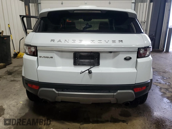 2015 Land Rover Range Rover Evoque Prestige with VIN SALVV2BG2FH036658, listed as a Copart auction lot 86829314 with 104,895 mi miles and Salvage title. Bid and sale history available at DreamBid. Image 6.