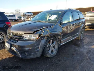 2015 Dodge Journey Crossroad with VIN 3C4PDCGB4FT735216, listed as a IAAI auction lot 41069140 with 104,823 mi miles. Bid and sale history available at carsss.com. Image 17.