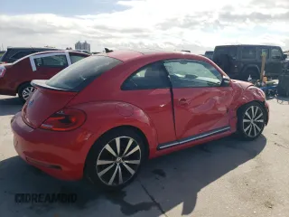 2014 Volkswagen Beetle Turbo R-Line with VIN 3VWVT7AT0EM656599, listed as a Copart auction lot 86358334 with 66,050 mi miles and Salvage Title. Bid and sale history available at DreamBid. Image 3.