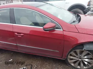 2013 Volkswagen CC VR6 Executive 4Motion with VIN WVWGU7AN9DE561506, listed as a IAAI auction lot 41459074 with 70,128 mi miles. Bid and sale history available at carsss.com. Image 12.
