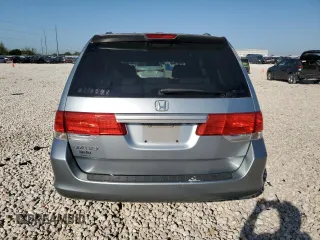 2009 Honda Odyssey EX-L with VIN 5FNRL38799B034292, listed as a Copart auction lot 52547205 with 116,658 mi miles and Salvage Title. Bid and sale history available at DreamBid. Image 6.