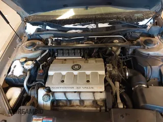 1999 Cadillac DeVille z VIN 1G6KD54Y1XU790845, wystawiony jako IAAI lot #41725809 z przebiegiem 174 088 mil mil oraz . Historia ofert i sprzedaży dostępna na DreamBid. Obrazek 10.