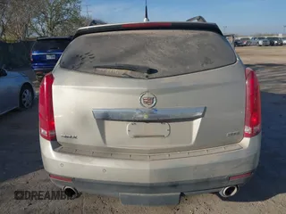 2014 Cadillac SRX Premium Collection with VIN 3GYFNDE37ES574109, listed as a IAAI auction lot 41770404 with 66,478 mi miles and . Bid and sale history available at DreamBid. Image 16.