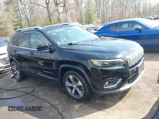2019 Jeep Cherokee Limited z VIN 1C4PJLDBXKD433958, wystawiony jako IAAI lot #41718399 z przebiegiem 135 977 mil mil oraz . Historia ofert i sprzedaży dostępna na DreamBid. Obrazek 1.