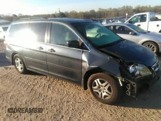 2006 Honda Odyssey EX-L with VIN 5FNRL386X6B452864, listed as a IAAI auction lot 41878327 with 197,923 mi miles. Bid and sale history available at carsss.com. Image 1.