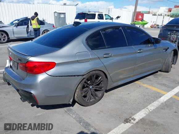 2020 BMW M5 Competition z VIN WBSJF0C05LB448878, wystawiony jako IAAI lot #41796245 z przebiegiem 62 856 mil mil oraz . Historia ofert i sprzedaży dostępna na DreamBid. Obrazek 4.
