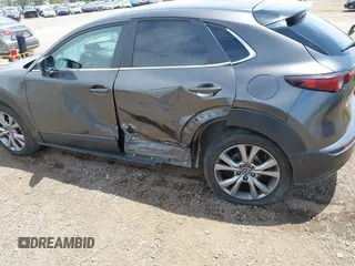 2021 Mazda CX-30 Select with VIN 3MVDMABL5MM210517, listed as a IAAI auction lot 42245033 with 191,303 mi miles and . Bid and sale history available at DreamBid. Image 6.