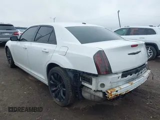 2014 Chrysler 300 S with VIN 2C3CCABG9EH355602, listed as a IAAI auction lot 42244756 with 165,816 mi miles and . Bid and sale history available at DreamBid. Image 3.