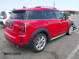 2023 MINI Countryman Cooper S z VIN WMZ53BR02P3R00984, wystawiony jako IAAI lot #42744505 z przebiegiem 27 432 mil mil oraz . Historia ofert i sprzedaży dostępna na DreamBid. Obrazek 4.