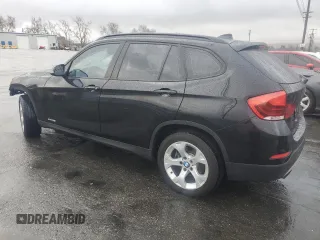 2015 BMW X1 sDrive28i with VIN WBAVM1C55FVW56937, listed as a Copart auction lot 45050785 with 77,736 mi miles and Salvage Title. Bid and sale history available at carsss.com. Image 2.