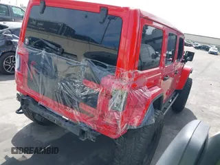 2019 Jeep Wrangler Unlimited Sahara with VIN 1C4HJXEN0KW552028, listed as a IAAI auction lot 41934634 with 53,054 mi miles and . Bid and sale history available at DreamBid. Image 4.