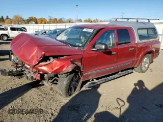2008 Dodge Dakota Laramie with VIN 1D7HW58N68S602809, listed as a Copart auction lot 77963754 with Not Provided miles and Salvage Title. Bid and sale history available at carsss.com. Image 1.
