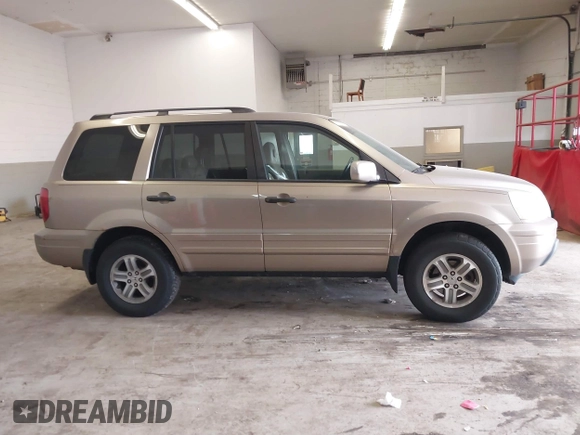 2005 Honda Pilot EX-L with VIN 5FNYF18565B019345, listed as a IAAI auction lot 41641423 with 282,099 mi miles. Bid and sale history available at carsss.com. Image 13.