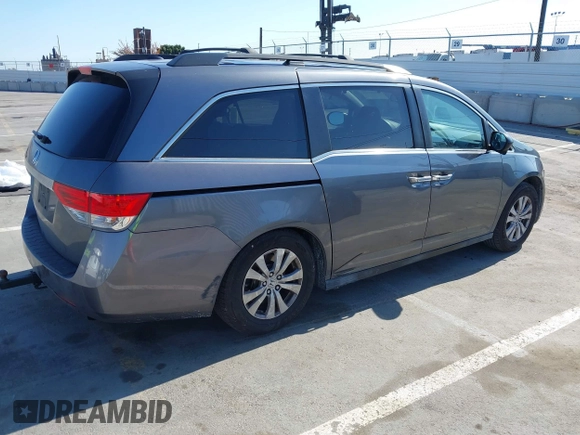 2014 Honda Odyssey EX-L with VIN 5FNRL5H66EB099792, listed as a IAAI auction lot 42160220 with 160,852 mi miles and . Bid and sale history available at carsss.com. Image 4.