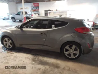2013 Hyundai Veloster w/Gray Int with VIN KMHTC6AD4DU117924, listed as a IAAI auction lot 41339465 with 156,004 mi miles. Bid and sale history available at carsss.com. Image 15.