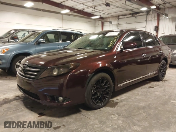 2011 Toyota Avalon with VIN 4T1BK3DB4BU433408, listed as a IAAI auction lot 40596175 with 123,529 mi miles and . Bid and sale history available at carsss.com. Image 2.