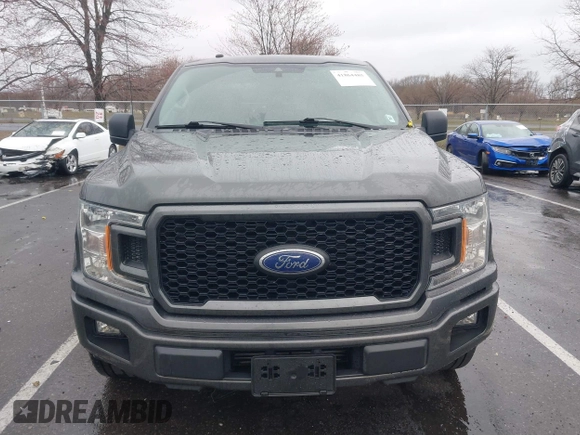 2019 Ford F-150 XL with VIN 1FTEW1CP8KKE94974, listed as a IAAI auction lot 41864485 with 114,893 mi miles and . Bid and sale history available at DreamBid. Image 12.