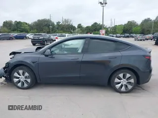 2024 Tesla Model Y with VIN 7SAYGDED3RF002246, listed as a IAAI auction lot 41566184 with 10,316 mi miles and . Bid and sale history available at DreamBid. Image 13.