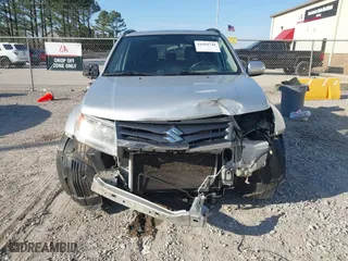 2013 Suzuki Grand Vitara Limited with VIN JS3TE0D74D4100091, listed as a IAAI auction lot 41684748 with 176,696 mi miles. Bid and sale history available at carsss.com. Image 13.