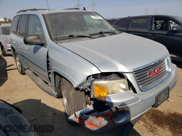 2007 GMC Envoy SLT with VIN 1GKDS13S572158514, listed as a Copart auction lot 74208144 with 209,797 mi miles and Salvage Title. Bid and sale history available at carsss.com. Image 4.