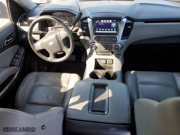 2019 Chevrolet Tahoe LT with VIN 1GNSCBKC5KR353908, listed as a Copart auction lot 41826985 with 97,949 mi miles and Clean Title. Bid and sale history available at carsss.com. Image 8.