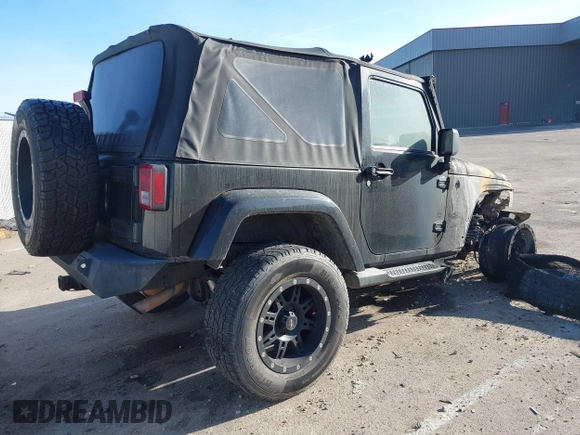 2011 Jeep Wrangler Sahara with VIN 1J4AA5D14BL514060, listed as a IAAI auction lot 41142809 with Not Provided miles and . Bid and sale history available at DreamBid. Image 4.