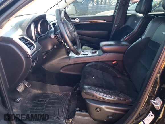 2012 Jeep Grand Cherokee SRT8 with VIN 1C4RJFDJ2CC352056, listed as a Copart auction lot 48810994 with 114,807 mi miles and Salvage Title. Bid and sale history available at carsss.com. Image 7.