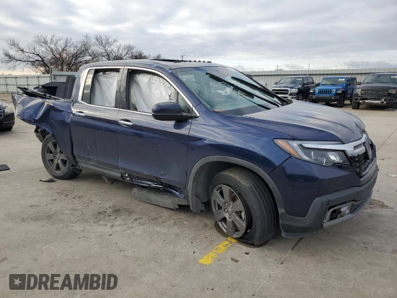 2020 Honda Ridgeline RTL-E with VIN 5FPYK3F71LB013551, listed as a Copart auction lot 37805883 with Not provided miles and . Bid and sale history available at DreamBid. Image 4.