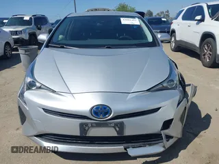 2018 Toyota Prius Two with VIN JTDKBRFU6J3068322, listed as a IAAI auction lot 42001483 with 57,597 mi miles. Bid and sale history available at carsss.com. Image 12.