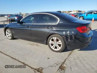 2017 BMW 3 Series 330e iPerformance with VIN WBA8E1C31HA156504, listed as a Copart auction lot 47971015 with 77,396 mi miles and Salvage Title. Bid and sale history available at carsss.com. Image 2.