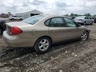 2003 Ford Taurus SES Standard z VIN 1FAFP55U33A123732, wystawiony jako Copart lot #58837395 z przebiegiem 169 159 mil mil oraz Szkoda całkowita • Salvage title. Historia ofert i sprzedaży dostępna na DreamBid. Obrazek 3.