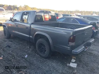 2003 Dodge Dakota Sport with VIN 1D7HL38NX3S190271, listed as a IAAI auction lot 41264054 with 139,498 mi miles. Bid and sale history available at carsss.com. Image 3.