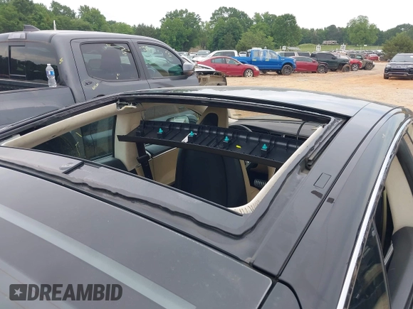 2014 Tesla Model S 60 with VIN 5YJSA1H10EFP34137, listed as a IAAI auction lot 42311565 with Not provided miles and . Bid and sale history available at DreamBid. Image 6.