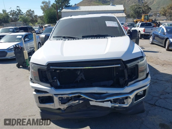 2018 Ford F-150 XL with VIN 1FTEW1CP0JKC28072, listed as a IAAI auction lot 41558764 with 153,402 mi miles. Bid and sale history available at carsss.com. Image 12.
