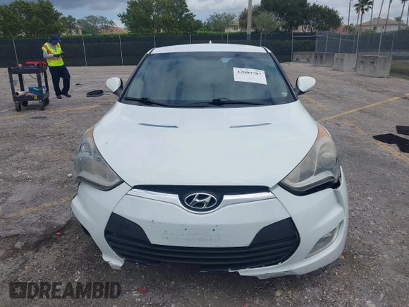 2015 Hyundai Veloster z VIN KMHTC6AD7FU222377, wystawiony jako IAAI lot #42000787 z przebiegiem 150 582 mil mil oraz . Historia ofert i sprzedaży dostępna na DreamBid. Obrazek 12.