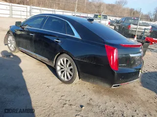 2015 Cadillac XTS Luxury with VIN 2G61N5S34F9226182, listed as a IAAI auction lot 41554394 with 119,194 mi miles. Bid and sale history available at carsss.com. Image 3.