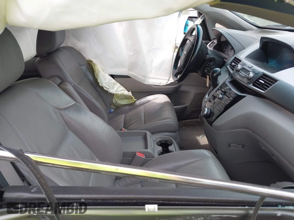 2012 Honda Odyssey EX-L with VIN 5FNRL5H64CB028040, listed as a IAAI auction lot 42126048 with 160,675 mi miles and . Bid and sale history available at DreamBid. Image 5.