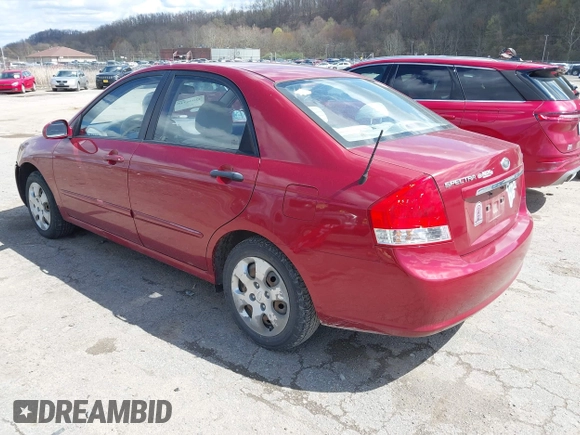 2009 Kia Spectra EX with VIN KNAFE221495665378, listed as a IAAI auction lot 42036945 with 153,254 mi miles. Bid and sale history available at carsss.com. Image 3.