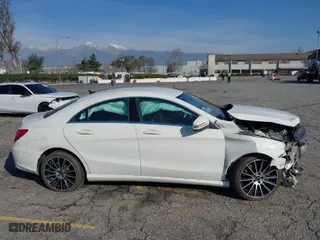 2016 Mercedes-Benz CLA with VIN WDDSJ4EB6GN333412, listed as a IAAI auction lot 34869801 with 121,179 mi miles. Bid and sale history available at carsss.com. Image 14.