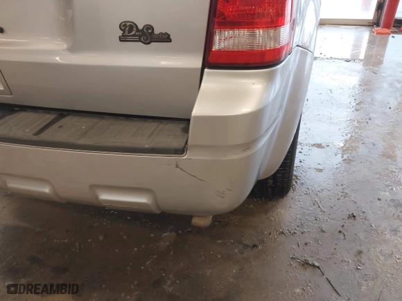2010 Ford Escape XLT with VIN 1FMCU0D70AKB09942, listed as a IAAI auction lot 41572582 with 218,296 mi miles. Bid and sale history available at carsss.com. Image 21.