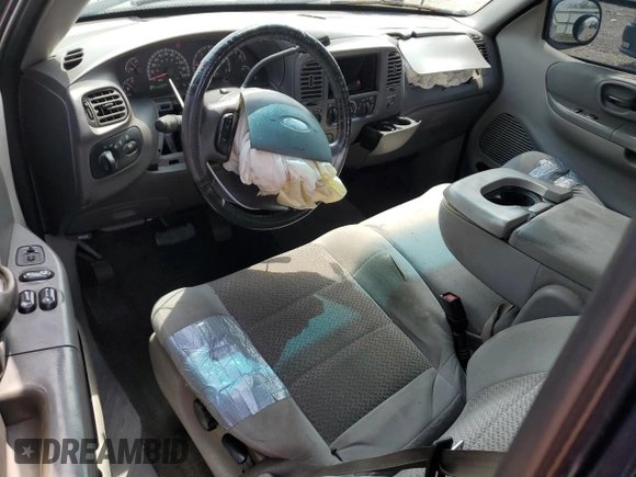 2003 Ford F-150 XL with VIN 1FTRX18L73NB65607, listed as a Copart auction lot 55025085 with 241,434 mi miles and Salvage title. Bid and sale history available at DreamBid. Image 8.