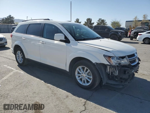 2017 Dodge Journey SXT with VIN 3C4PDCBG7HT531547, listed as a Copart auction lot 52322685 with 121,876 mi miles and Salvage title. Bid and sale history available at DreamBid. Image 4.