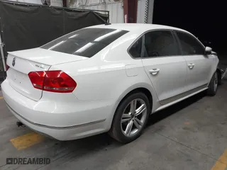 2013 Volkswagen Passat TDI SEL Premium with VIN 1VWCN7A39DC011421, listed as a IAAI auction lot 42042189 with 141,670 mi miles. Bid and sale history available at carsss.com. Image 4.