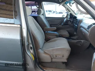 2003 Toyota Sequoia SR5 with VIN 5TDZT34A13S149313, listed as a IAAI auction lot 41841538 with 210,440 mi miles. Bid and sale history available at carsss.com. Image 5.