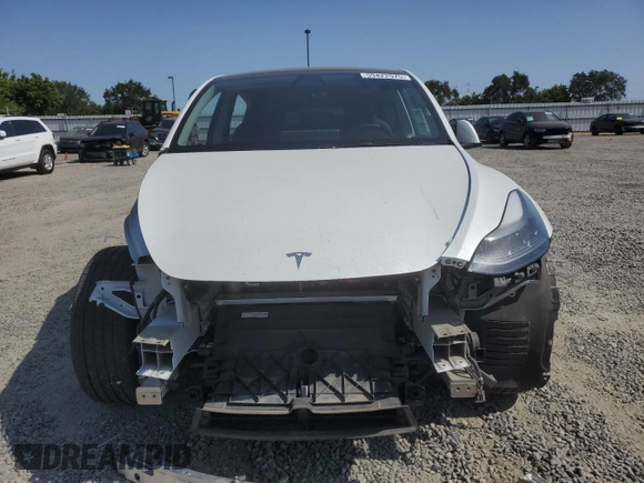 2024 Tesla Model Y Long Range with VIN 7SAYGAEE2RF103110, listed as a Copart auction lot 59422975 with 13,572 mi miles and Salvage title. Bid and sale history available at DreamBid. Image 5.