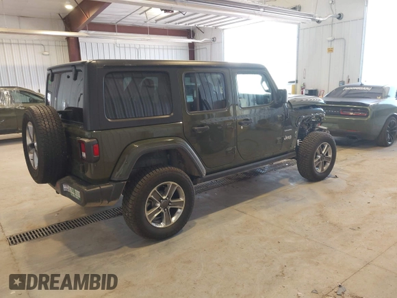 2021 Jeep Wrangler Unlimited Sahara z VIN 1C4HJXEN2MW592565, wystawiony jako IAAI lot #41956072 z przebiegiem 95 504 mil mil oraz . Historia ofert i sprzedaży dostępna na DreamBid. Obrazek 4.