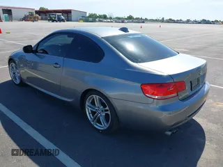 2010 BMW 3 Series 328i with VIN WBAWV1C51AP123689, listed as a IAAI auction lot 41966621 with 187,428 mi miles. Bid and sale history available at carsss.com. Image 3.