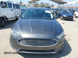 2020 Ford Fusion SE with VIN 3FA6P0T99LR173347, listed as a IAAI auction lot 42090457 with 118,359 mi miles and . Bid and sale history available at DreamBid. Image 12.