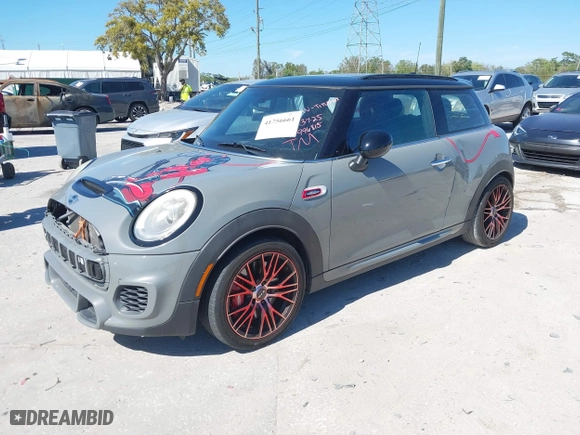 2016 MINI Hardtop 2 Door John Cooper Works with VIN WMWXM9C58GT996815, listed as a IAAI auction lot 41756661 with 146,450 mi miles. Bid and sale history available at carsss.com. Image 19.