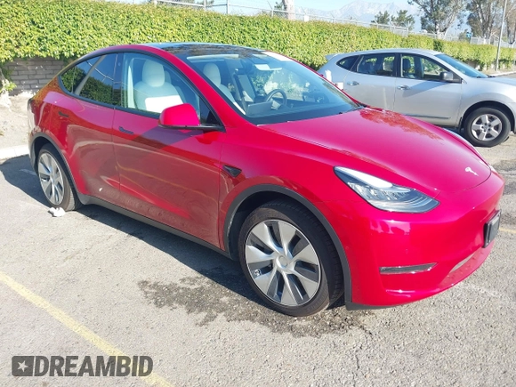 2020 Tesla Model Y Long Range with VIN 5YJYGDEE8LF057014, listed as a IAAI auction lot 41988113 with 18,246 mi miles and . Bid and sale history available at DreamBid. Image 1.